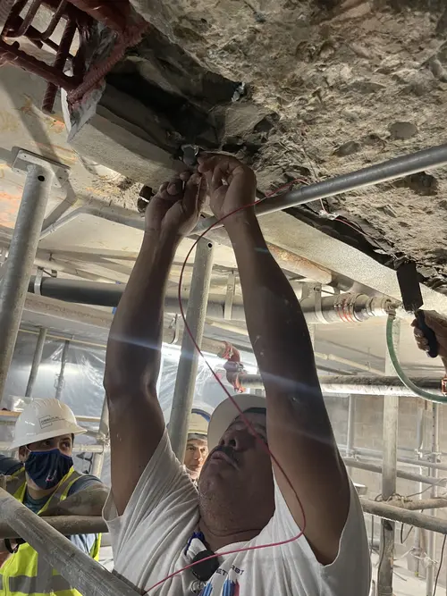 Contractor installing PatchGuard Connect Anodes